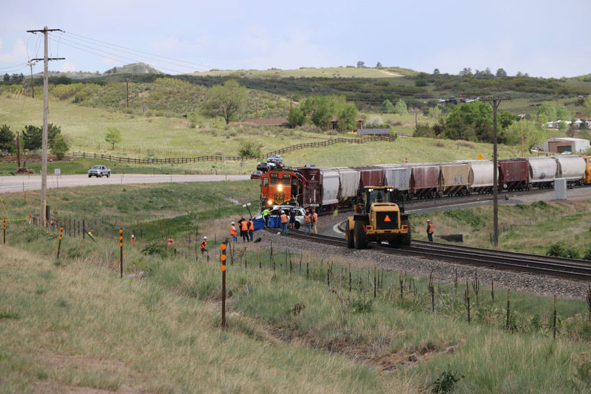 Two people were killed after a car and train collided at Highway 85, south of Ron King Trail on May 15. The vehicle was pushed roughly 1,500 yards on the track, according to the sheriff's office. Photo by Alex DeWind